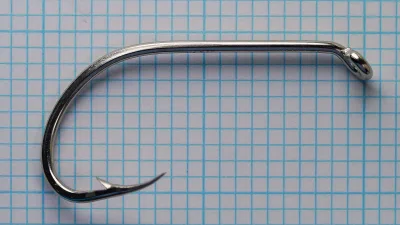 Mustad 92627 Flounder — hook specimen, full eye view — ball eye formation — turned-down orientation — wire butt detail