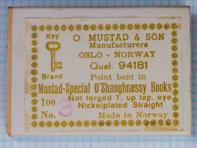 Mustad 94181 box label — front panel with gold letterpress printing — model code and specifications visible