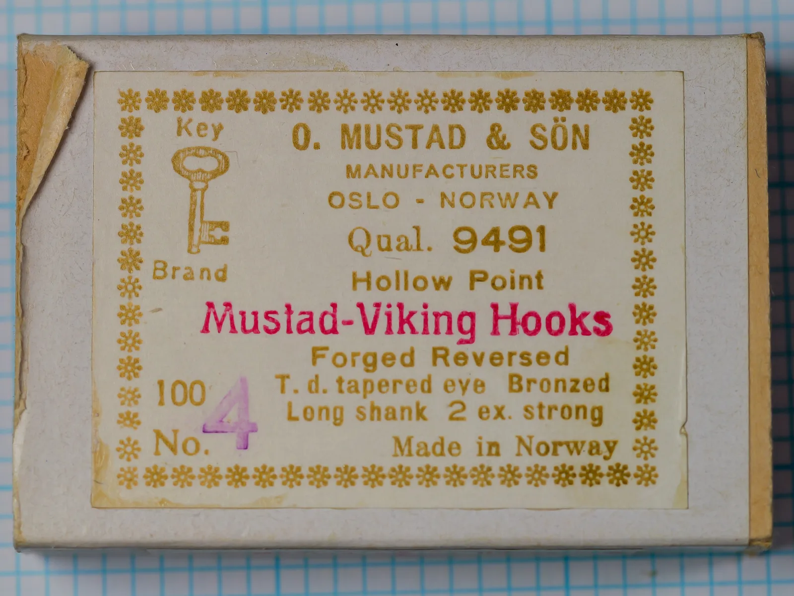 Mustad-Viking Hooks model 9491 — manufacturer box exterior showing front panel with company name, model designation, product specifications, and decorative Art Deco border — size No. 4 — offset letterpress printing in gold and red ink
