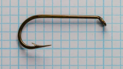 Mustad-Viking Hooks No. 4 — full-length side view showing eye detail, shank profile, and bend geometry — size 4 — bronzed finish