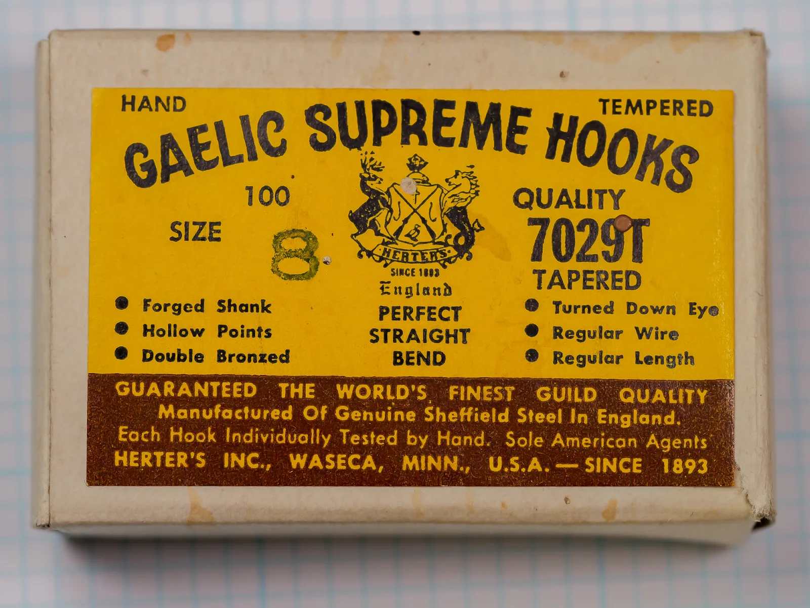 Box of Herter's Gaelic Supreme Hooks, model 7029T, size 8, with a yellow label, central crest and brown lower band.