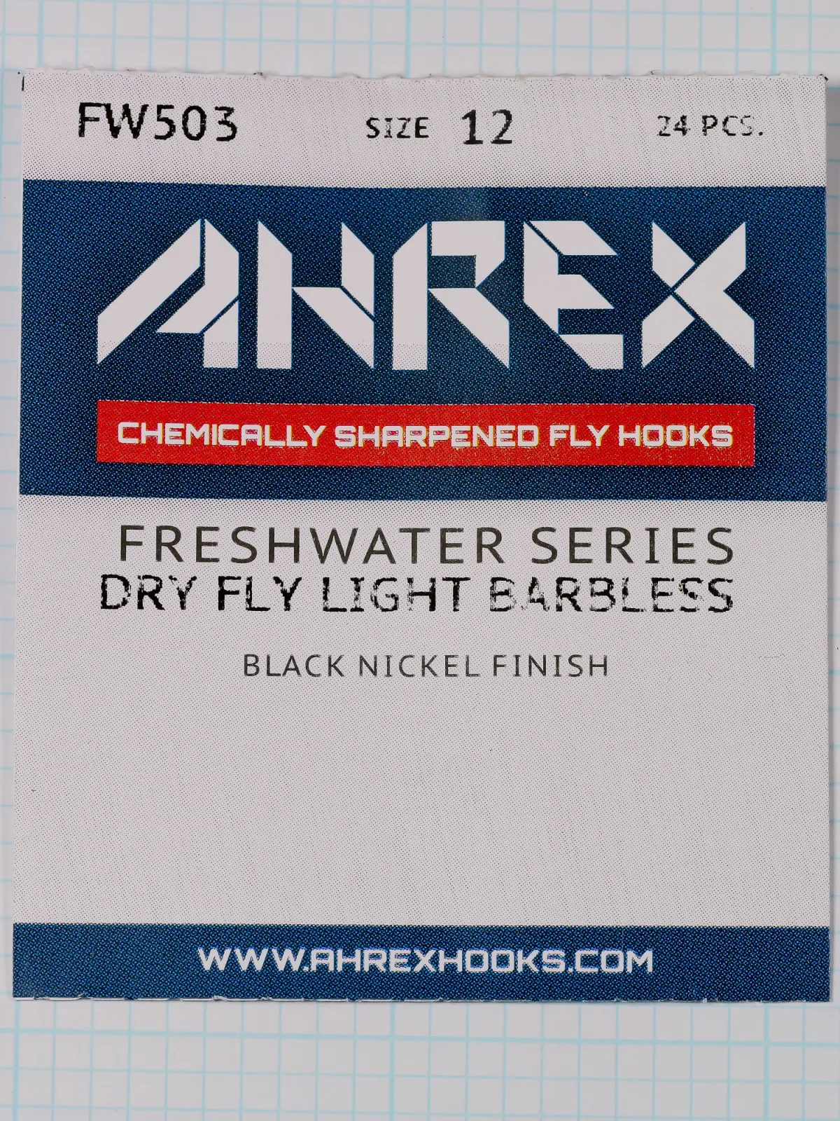 Front of the Ahrex FW503 packet with the model code and size along the top, the AHREX wordmark on a blue band, and the words Freshwater Series, Dry Fly Light Barbless and Black Nickel Finish.