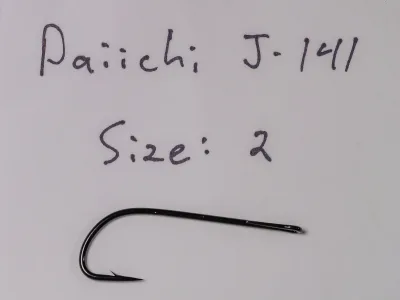 Handwritten note reading "Daiichi J·1411" and "Size: 2" above a loose black hook on plain paper.