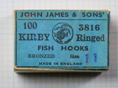 Blue box label printed JOHN JAMES & SONS', 100 KIRBY Ringed 3816 FISH HOOKS, BRONZED, Size with a handwritten 11, MADE IN ENGLAND, and a round trademark.