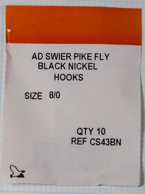 Front of a small packet with an orange band across the top and printed lines naming the Ad Swier Pike Fly, black nickel, size 8/0, quantity 10 and reference CS43BN.