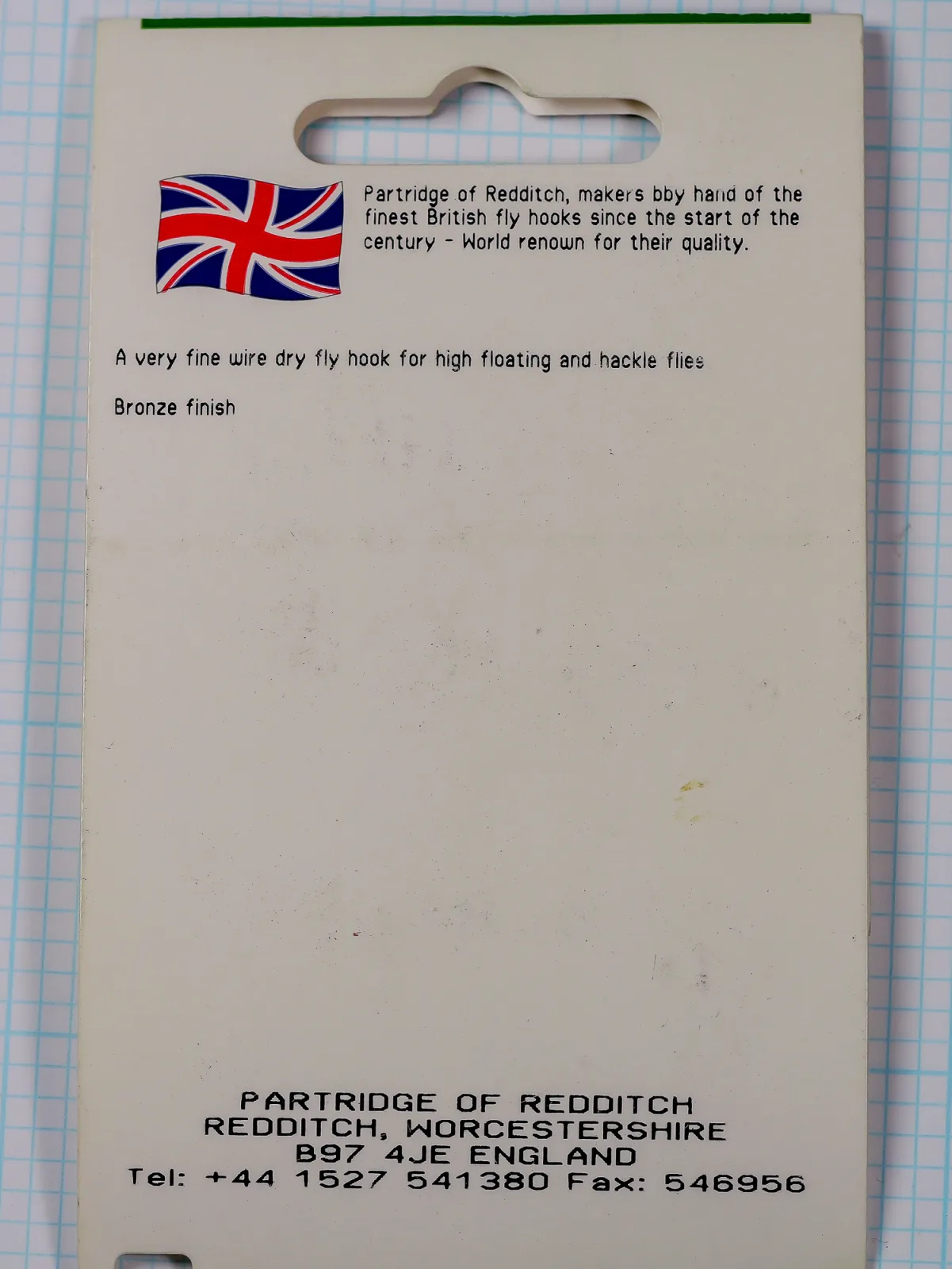 Back of the Partridge L4A green hanger card: Union Jack illustration, description text, and a Redditch address and telephone number.
