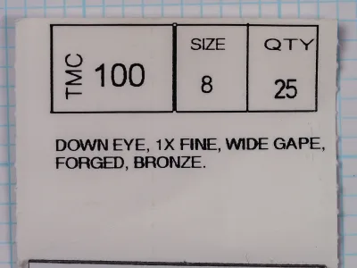 Tiemco 100 size 8 hook label showing TMC 100 model, size 8, quantity 25, down eye fine wire bronze specs